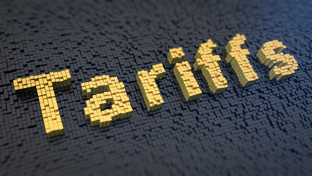 Word 'Tariffs' of the yellow square pixels on a black matrix background